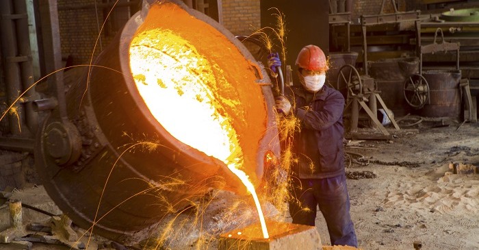 How is iron extracted from its ore
