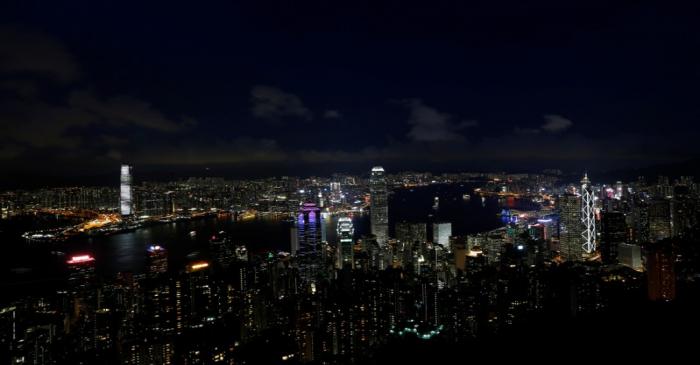 Lights light up the skyline of Hong Kong in the evening