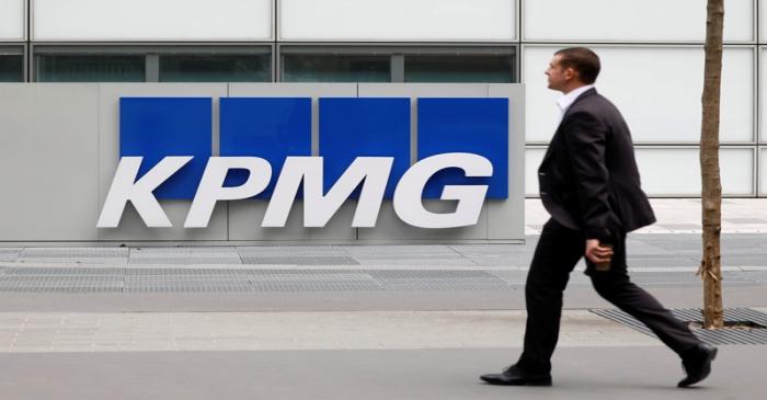 The KPMG logo is seen at the company's head offices at La Defense business and financial
