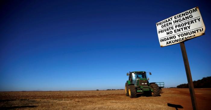 FILE PHOTO: A 'No entry sign' is seen at an entrance of a farm outside Witbank, Mpumalanga