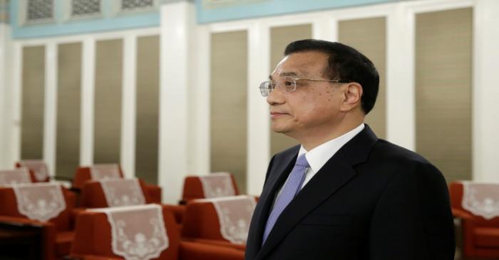 China's Premier Li Keqiang waits to meet Administrator of UNDP Achim Steiner in Beijing