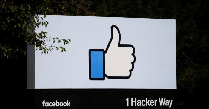 FILE PHOTO: The entrance sign to Facebook headquarters is seen in Menlo Park