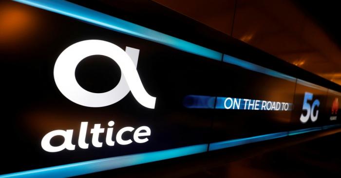 FILE PHOTO: An advertising board is seen during the first demonstration of the technology 5G in
