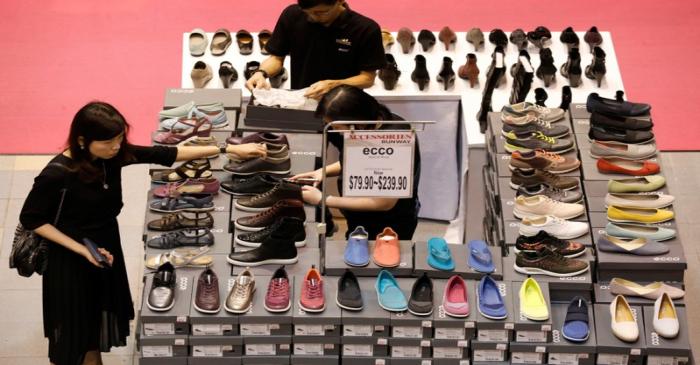 A woman shops for shoes in Singapore