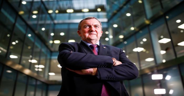 FILE PHOTO: CEO of Randgold Mark Bristow poses for a photograph at the London Stock Exchange,