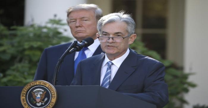 FILE PHOTO: U.S. President Donald Trump looks on as Jerome Powell, his nominee to become