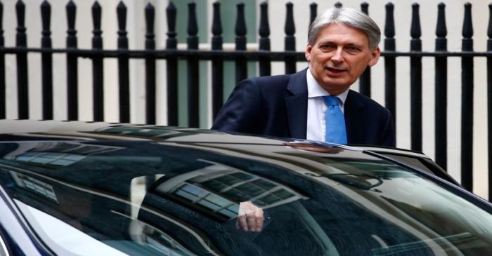 Britain's Chancellor of the Exchequer Philip Hammond leaves 11 Downing Street in London
