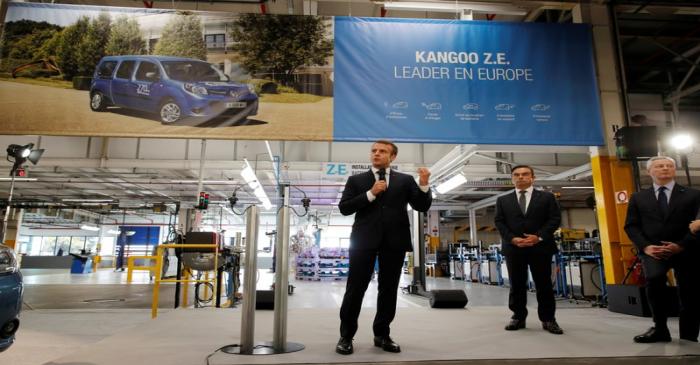 French President Emmanuel Macron and Carlos Ghosn, CEO of French car maker Renault, visit the