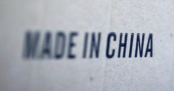 Words 'Made in China' are pictured on a box of products imported from China at a wholesale shop