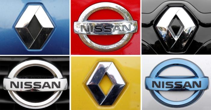 FILE PHOTO: A combination picture shows logos of Japan's Nissan and France's Renault on cars in