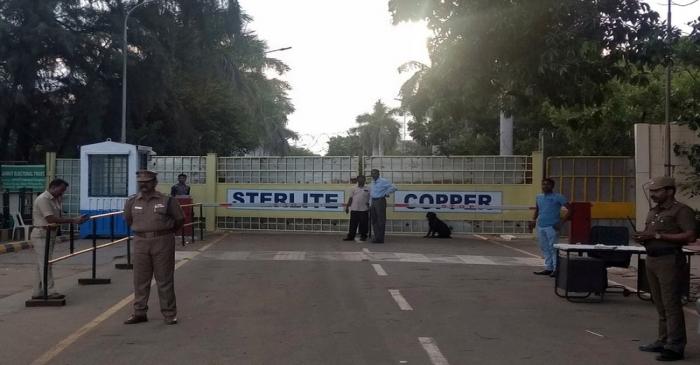 FILE PHOTO: Police stand guard outside a copper smelter controlled by London-listed Vedanta