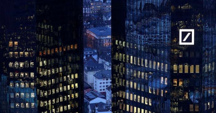 FILE PHOTO: The headquarters of Germany's Deutsche Bank are seen early evening in Frankfurt
