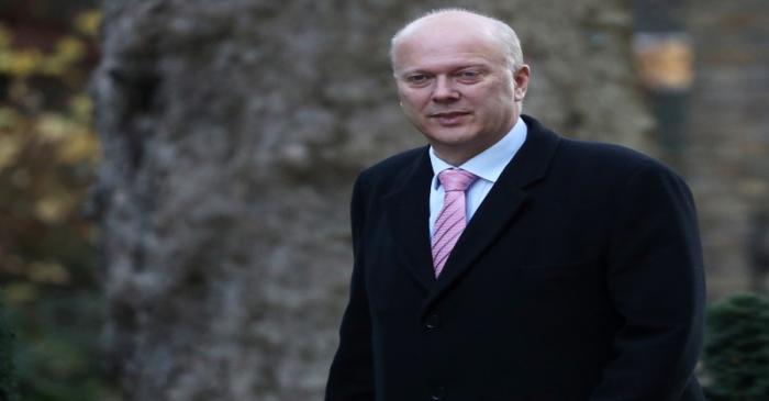Britain's Secretary of State for Transport, Chris Grayling, arrives in Downing Street, London