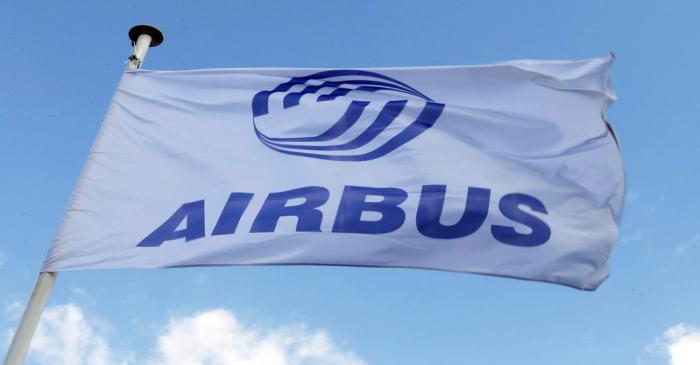FILE PHOTO: Flag with Airbus logo is pictured at the Airbus A380 final assembly line at Airbus