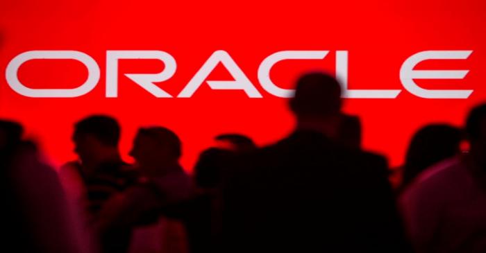 FILE PHOTO: People gather prior to keynote speech at the All Things Oracle OpenWorld Summit in