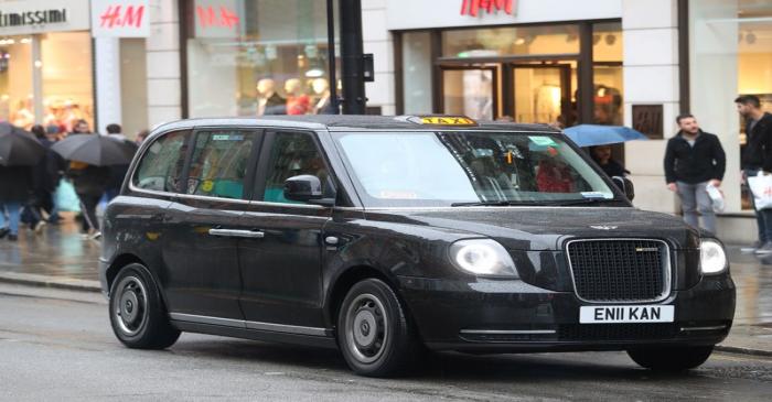 FILE PHOTO: A London Electric Vehicle Company (LEVC) TX electric black taxi driving on the