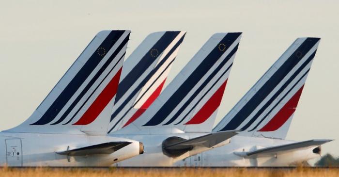 FILE PHOTO: Tails of Air France airplanes are seen at Charles de Gaulle airport near Paris