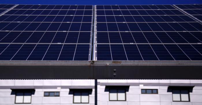 FILE PHOTO: A solar array, a linked collection of solar panels, can be seen in front of a
