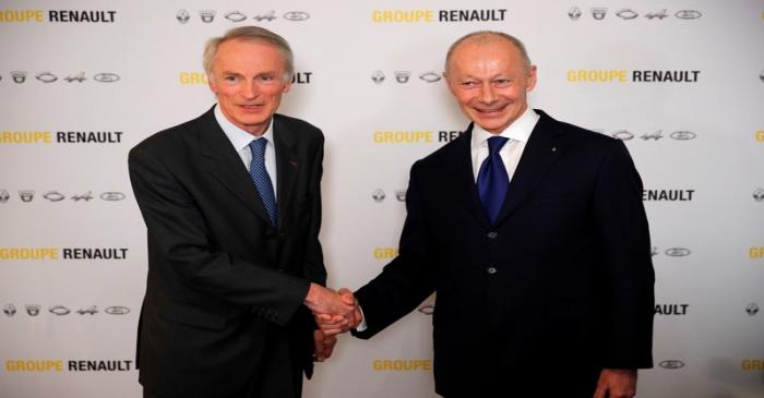 Jean-Dominique Senard, newly-appointed Chairman of Renault, shakes hands with Thierry Bollore,