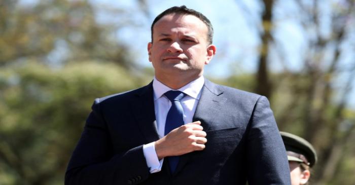 Ireland's Prime Minister (Taoiseach) and Defence Minister Leo Varadkar stands for the national