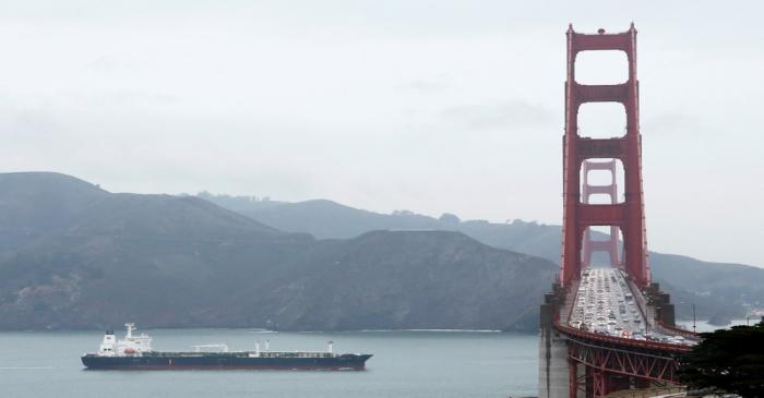 kbFILE PHOTO: An oil tanker passes underneath the Golden Gate Bridge during a rainfall in San