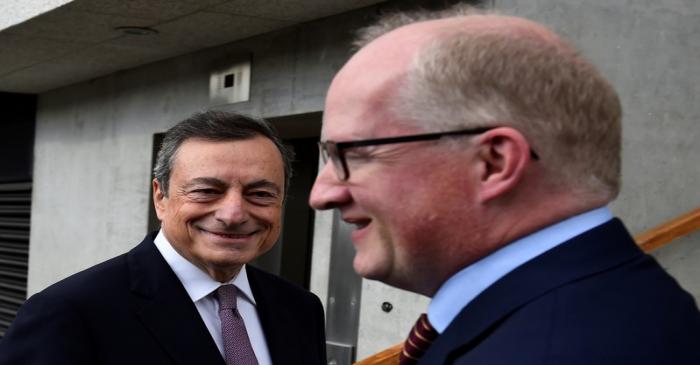 FILE PHOTO: President of the European Central Bank Mario Draghi greets Governor of the Central
