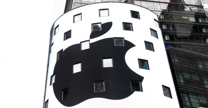 FILE PHOTO: An electronic screen displays the Apple Inc. logo on the exterior of the Nasdaq