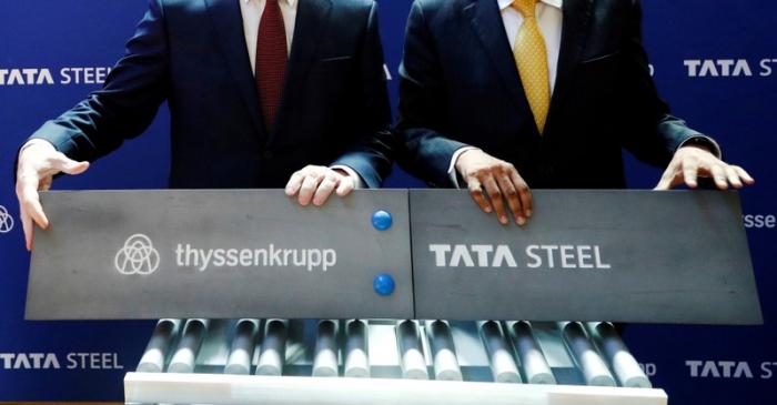 Germany's ThyssenKrupp CEO Hiesinger and Tata Sons Chairman Chandrasekaran pose at a joint news