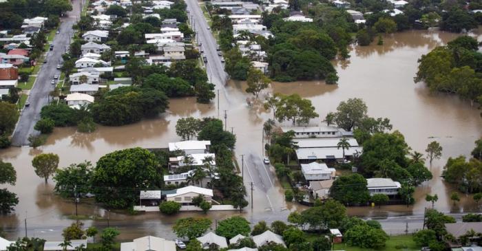 An aerial view shows flood waters in the suburb of Hyde Park, Townsville