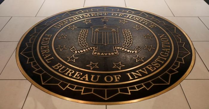 FILE PHOTO: The Federal Bureau of Investigation seal is seen at FBI headquarters in Washington