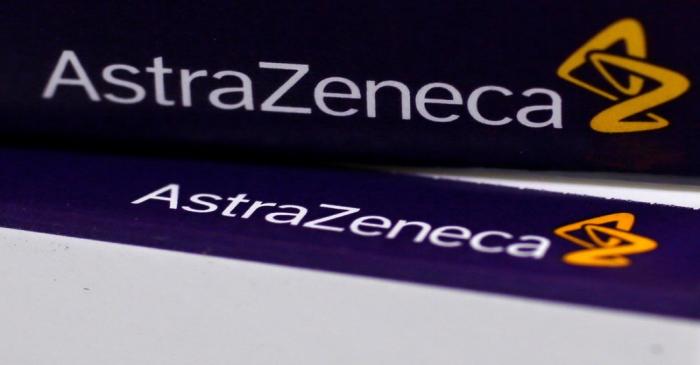 FILE PHOTO - The logo of AstraZeneca is seen on medication packages in a pharmacy in London