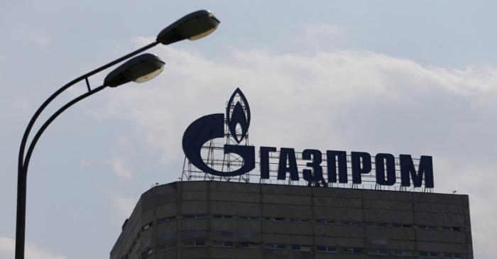 FILE PHOTO: A view shows the company logo of Gazprom installed on the roof of its office