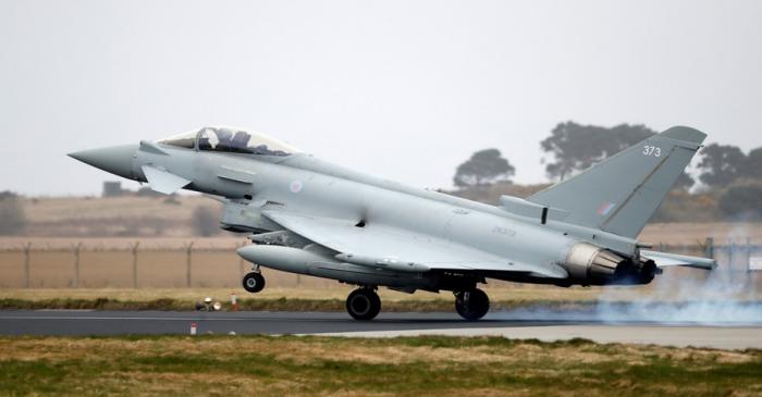 An RAF Typhoon jet lands at RAF Lossiemouth in Scotland