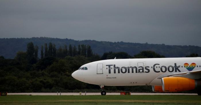 FILE PHOTO: A Thomas Cook Airbus A330 aircraft taxis across the tarmac at Manchester Airport in