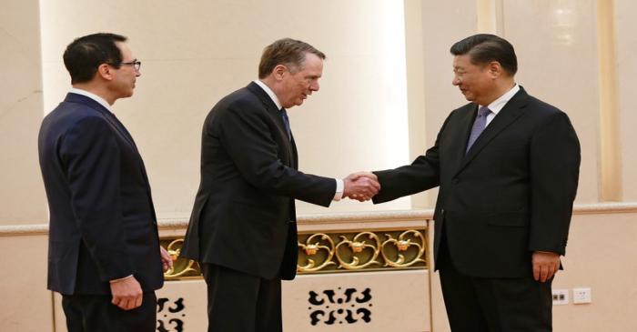 U.S. Trade Representative Robert Lighthizer shakes hands with Chinese President Xi Jinping  in