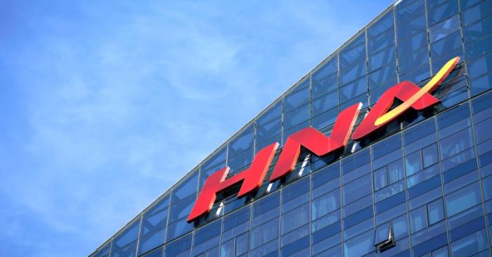 FILE PHOTO: A HNA Group logo is seen on the building of HNA Plaza in Beijing