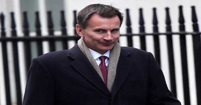 Britain's Foreign Secretary Jeremy Hunt walks in Downing Steet in London