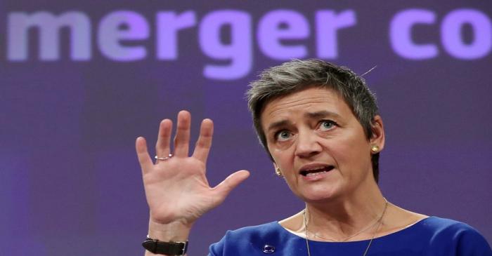 FILE PHOTO: EU Competition Commissioner Vestager talks to the media at the European Council