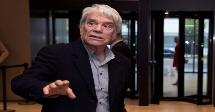 FILE PHOTO: French businessman Bernard Tapie arrives to attend the inauguration of the Altice