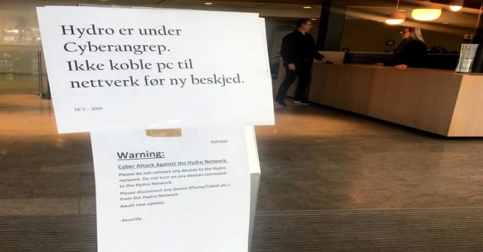 A sign warning employees not to connect devices to the network in the wake of a cyber attack is