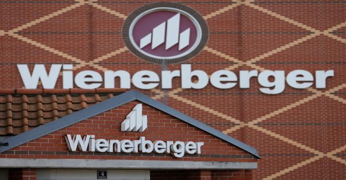 FILE PHOTO: Logos of Wienerberger, the world's biggest brick maker, are pictured at its