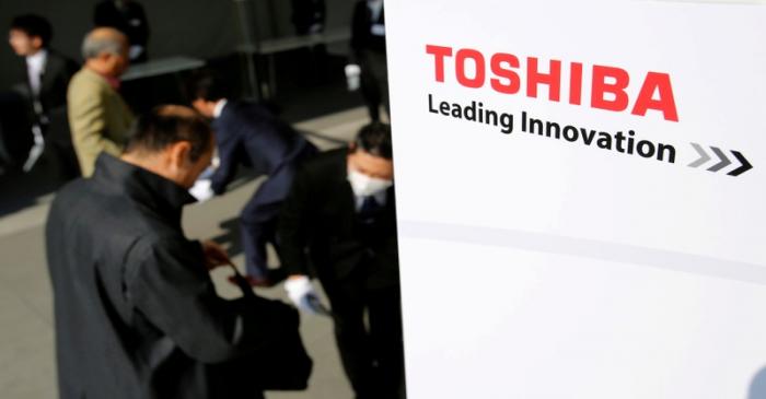 The logo of Toshiba is seen as shareholders arrive at Toshiba's extraordinary shareholders