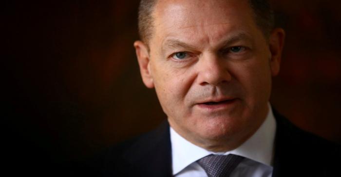 FILE PHOTO: German Finance Minister Olaf Scholz attends a Reuters interview in Berlin