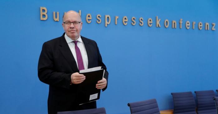 German Economy Minister Altmaier arrives to a news conference to present the 2019 spring