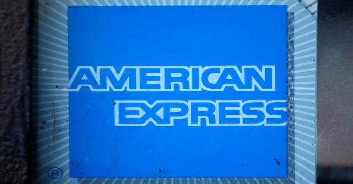 The logo of Dow Jones Industrial Average stock market index listed company American Express