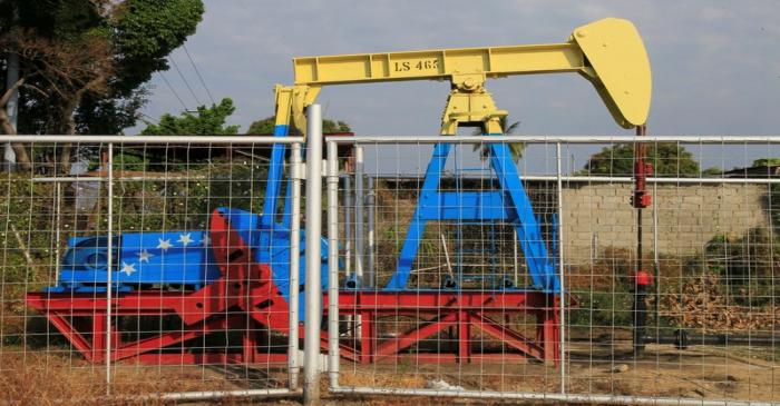 FILE PHOTO: An oil pumpjack painted with the colors of the Venezuelan flag is seen in