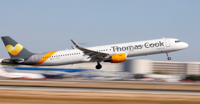 FILE PHOTO: A Thomas Cook Airbus A321 airplane takes off at Palma de Mallorca