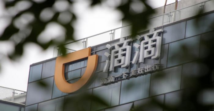 Logo of Didi Chuxing is seen at its headquarters building in Beijing