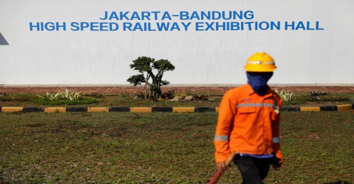 Worker stands in front of Jakarta-Bandung High Speed Railway exhibition hall at Walini tunnel