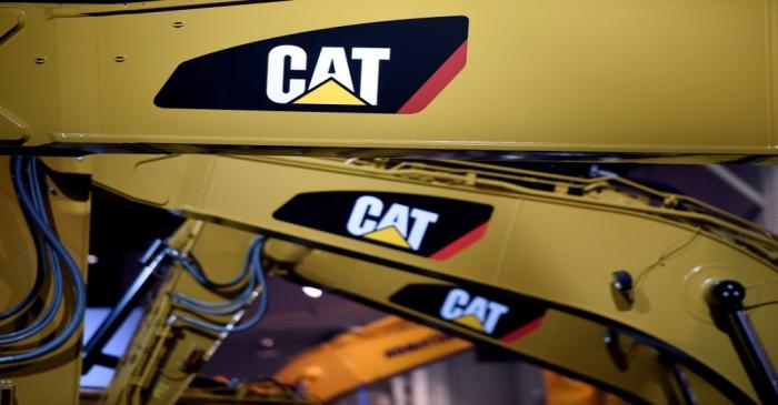 FILE PHOTO: A row of excavators are seen at the Caterpillar booth at the CONEXPO-CON/AGG